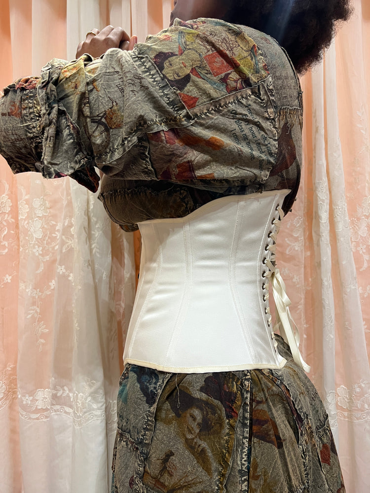 Side portrait of model in the Petite Cincher Corset - Ivory Satin